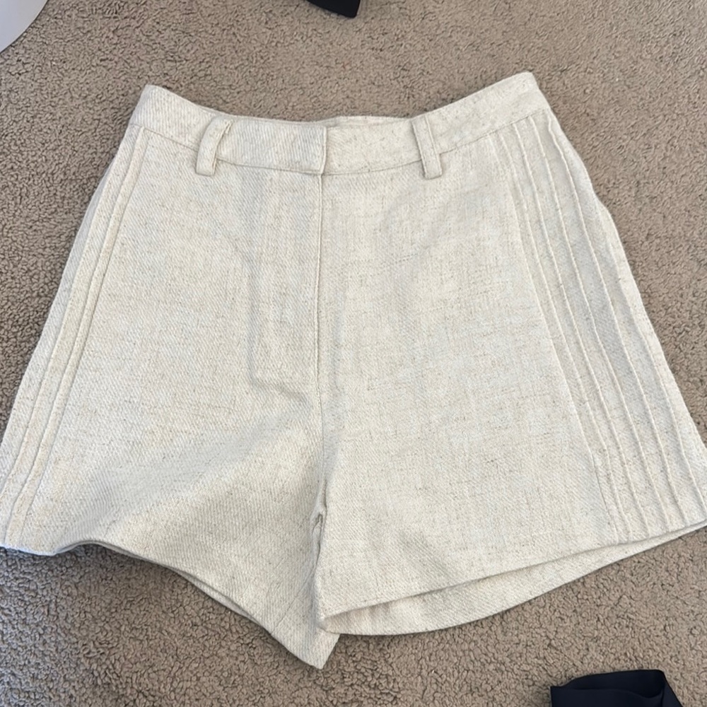 Torn by Ronny Kobo Cream High Waist Shorts